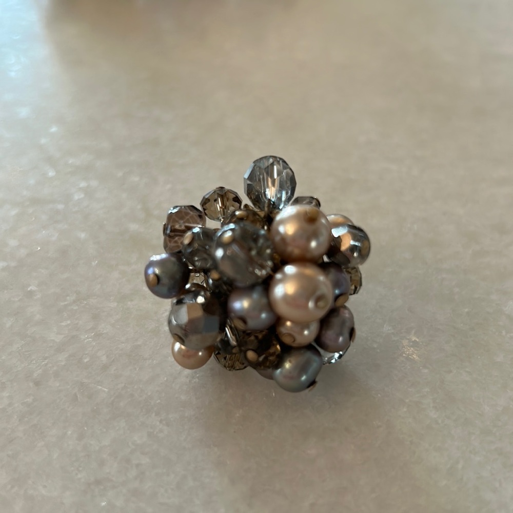 Stella and dot ring. Adjustable purple hues.
